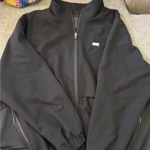 Figs scrub jacket size 3X but fits slightly smaller,in my opinion, slightly worn